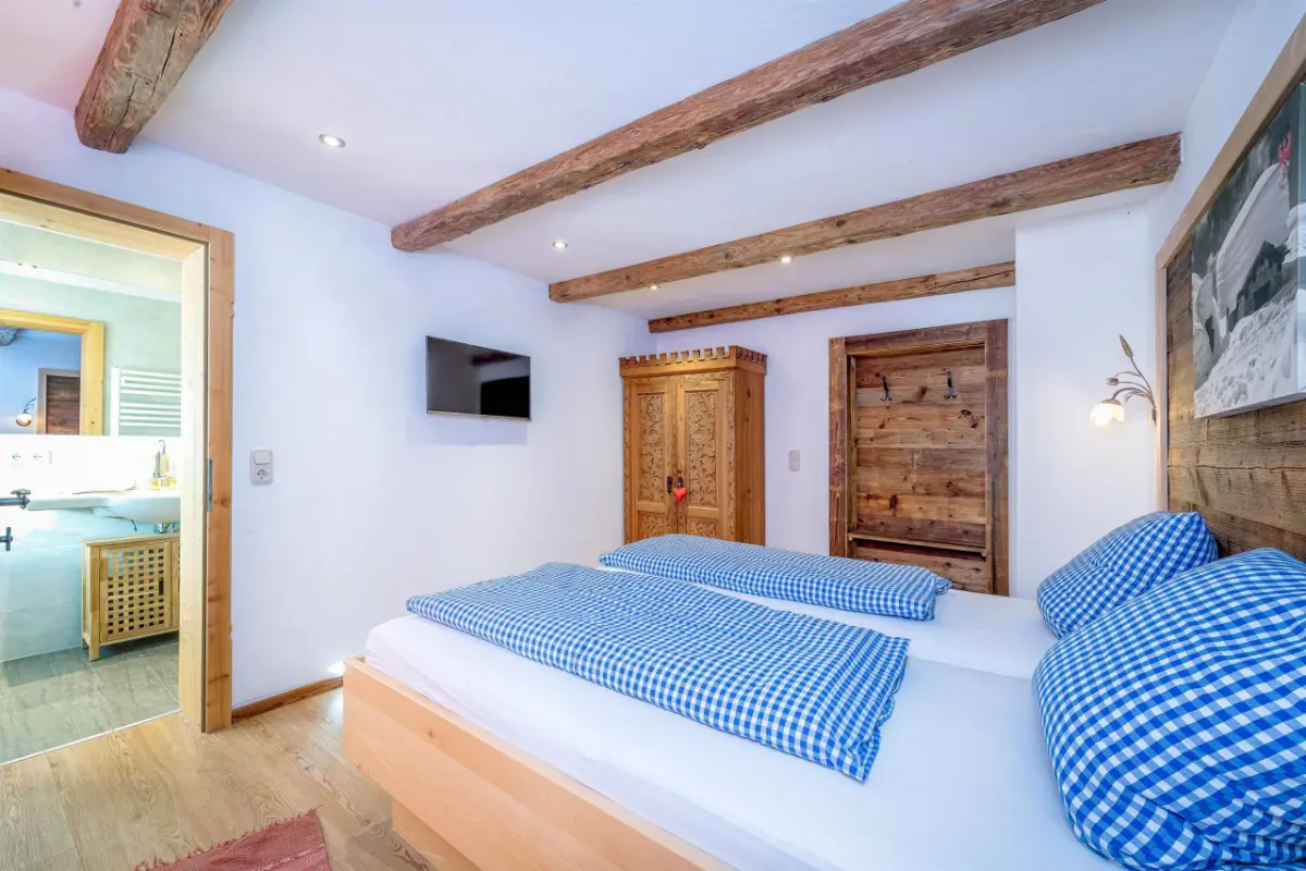 Schlafzimmer im Appartement Astbergblick — Ferienwohnung am Bauernhof Going am Wilden Kaiser
