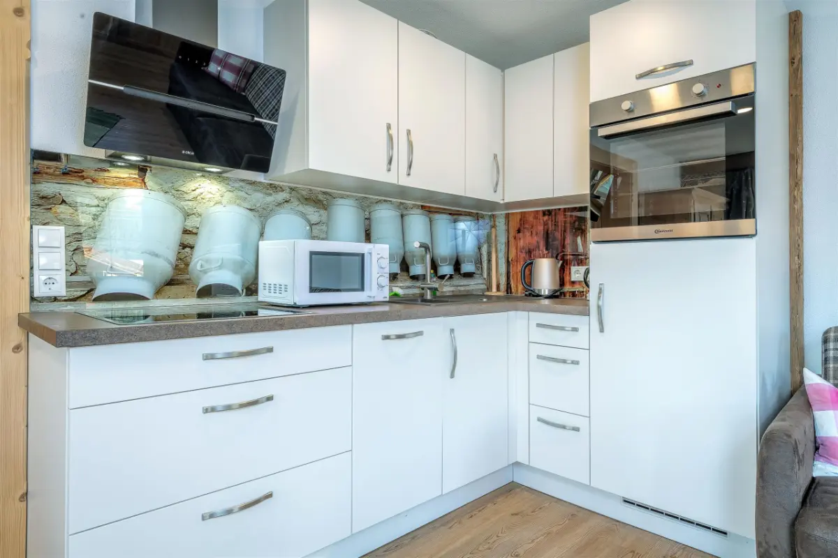 Küchenbereich mit Essplatz im Appartement Kaiserblick — Bauernhof-Ferienwohnung Going Tirol